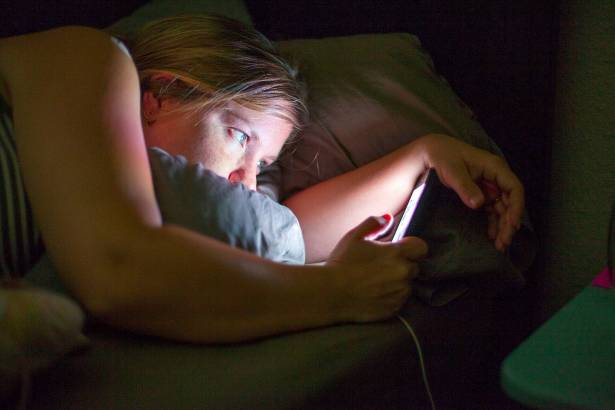 gallery_nrm_1424861698-woman-staring-at-phone-before-bed_909995_large.jpg